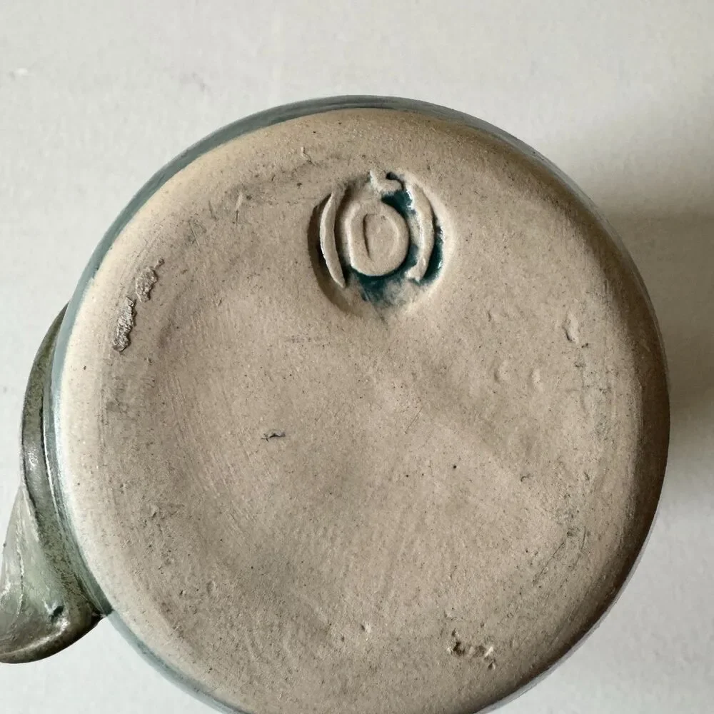 Handmade Leaf Handwarmer Ceramic Mug Dark Teal (Left)